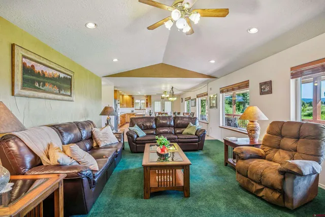 a bed room with a bed and a chandelier