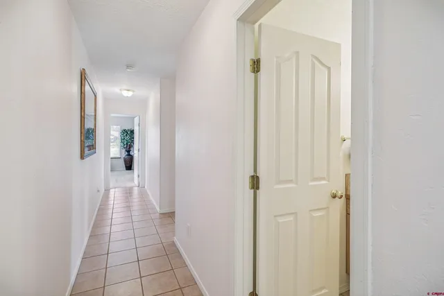 a large bathroom with a double vanity sink and a mirror