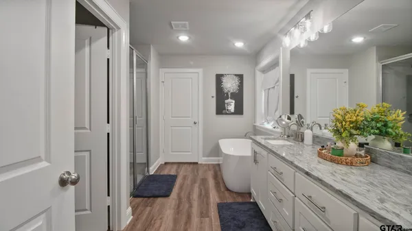 a bathroom with a white bath tub