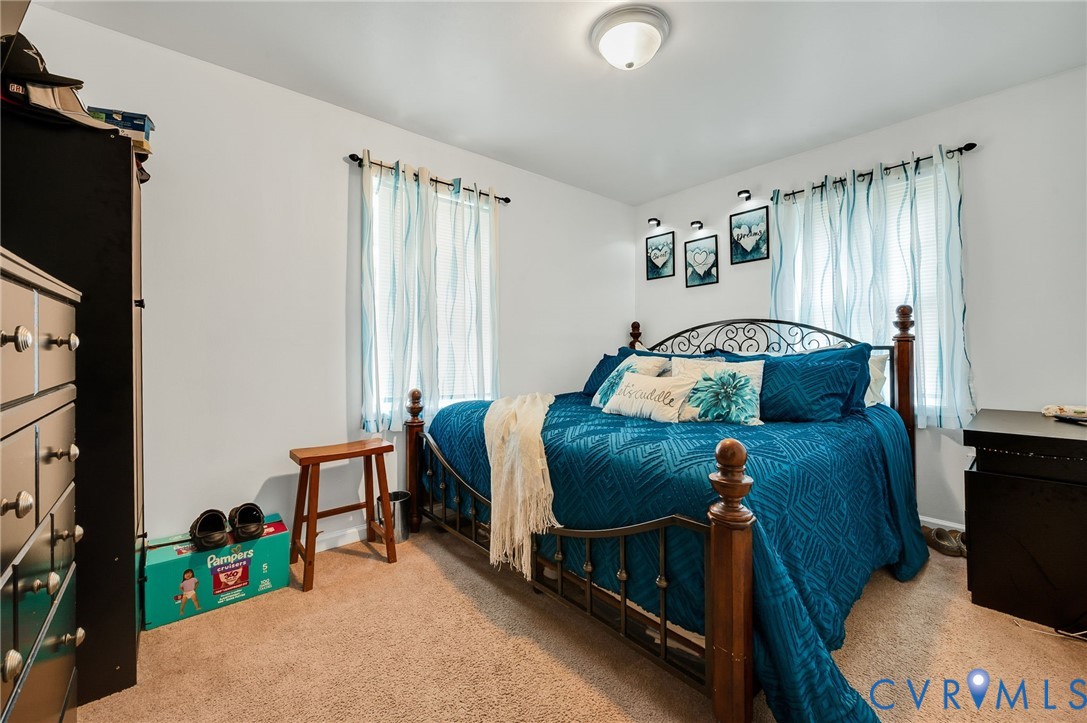 2909 Springview Drive Richmond, VA 23234 - Photo 13 of 19 a bedroom with furniture and a window
