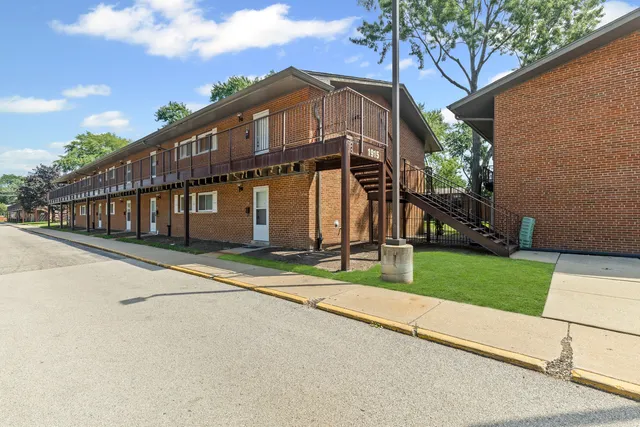 a kitchen that has a sink and a stove