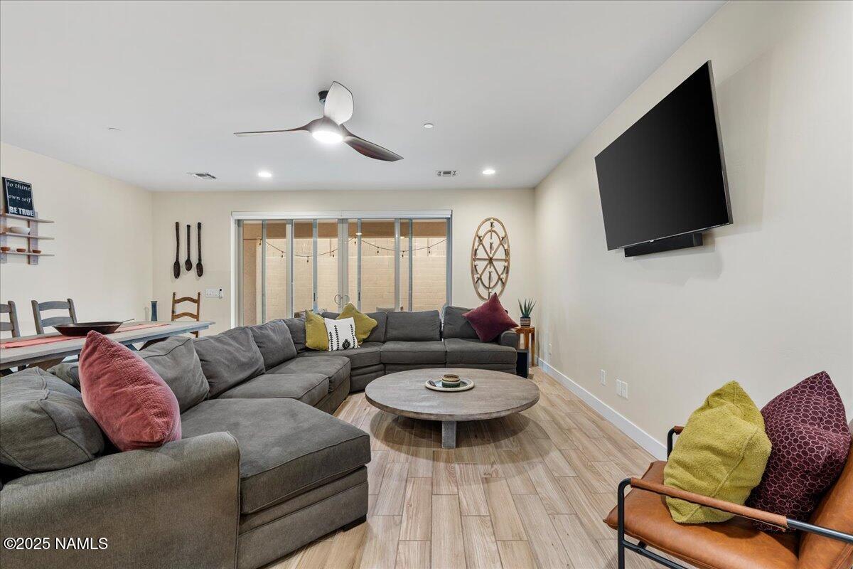524 Powder Box Road Clarkdale, AZ 86324 - Photo 12 of 32 a living room with furniture and a flat screen tv