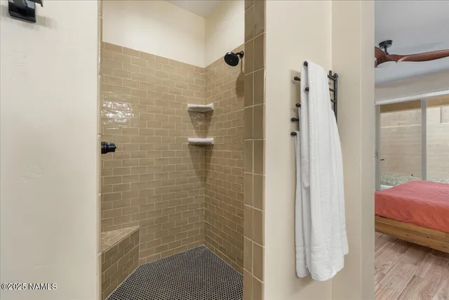 a room with a wooden floor and a window