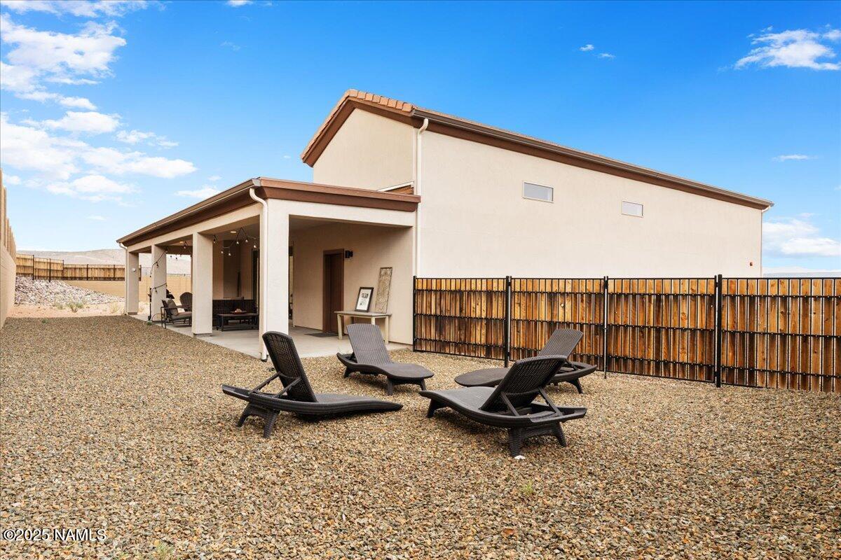 524 Powder Box Road Clarkdale, AZ 86324 - Photo 23 of 32 a view of a lounge chair on the roof deck
