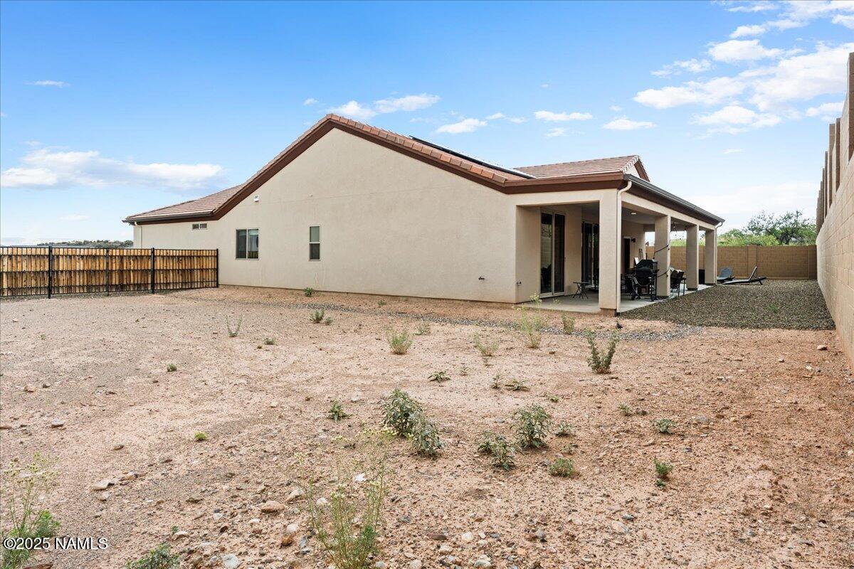 524 Powder Box Road Clarkdale, AZ 86324 - Photo 25 of 32 a view of a house with a yard