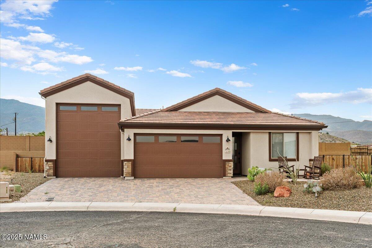 524 Powder Box Road Clarkdale, AZ 86324 - Photo 3 of 32 a front view of a house with yard
