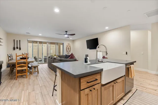 a view of kitchen island wooden floor