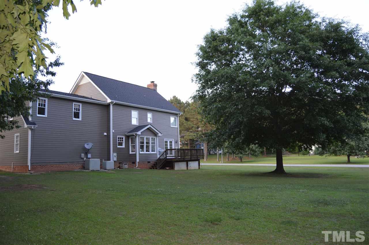 901 Lendermans Circle Raleigh, NC 27603 - Photo 22 of 25 a front view of a house with garden