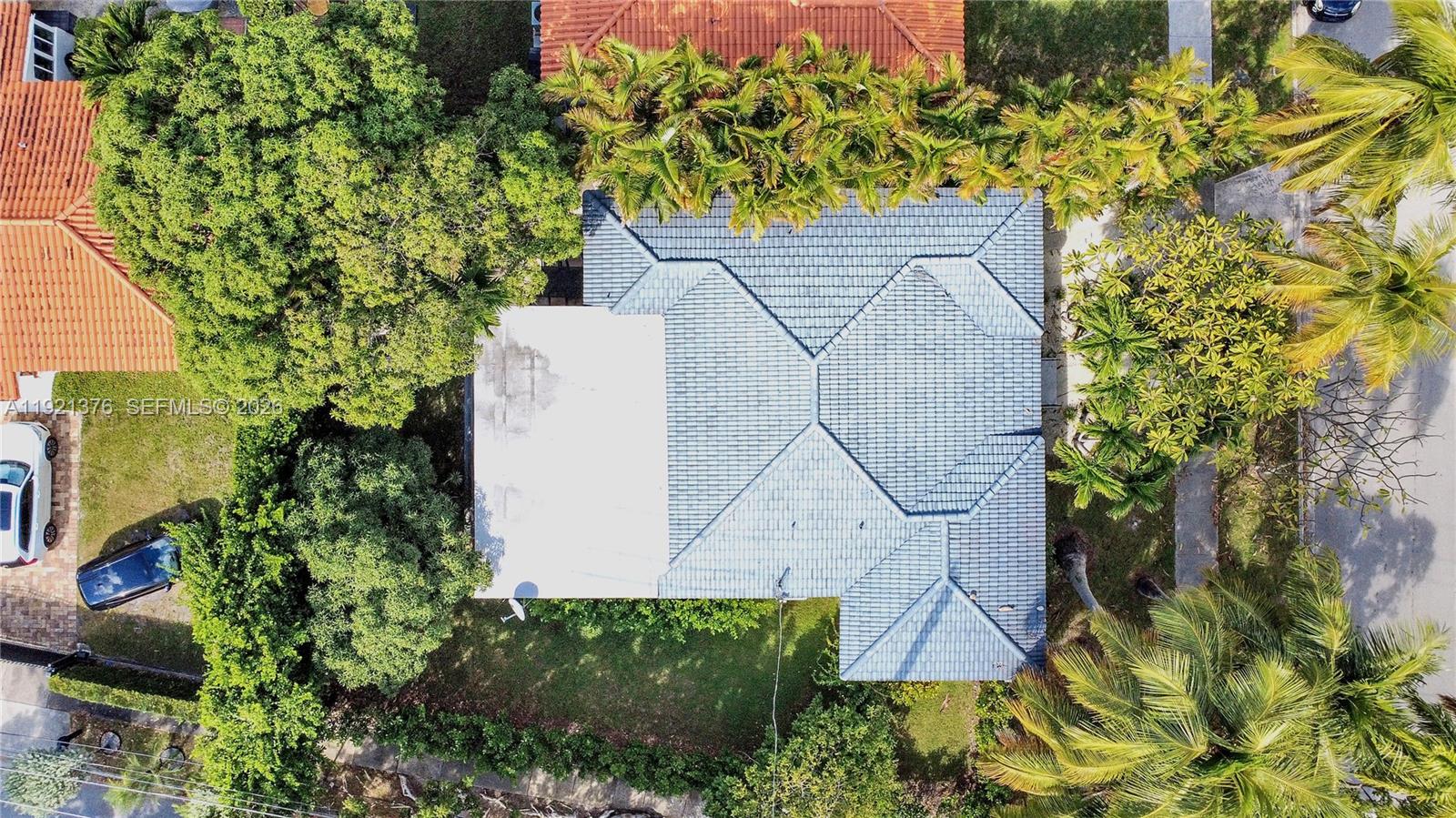 100 Southwest 30th Road Miami, FL 33129 - Photo 28 of 31 an aerial view of a house with a yard and plants