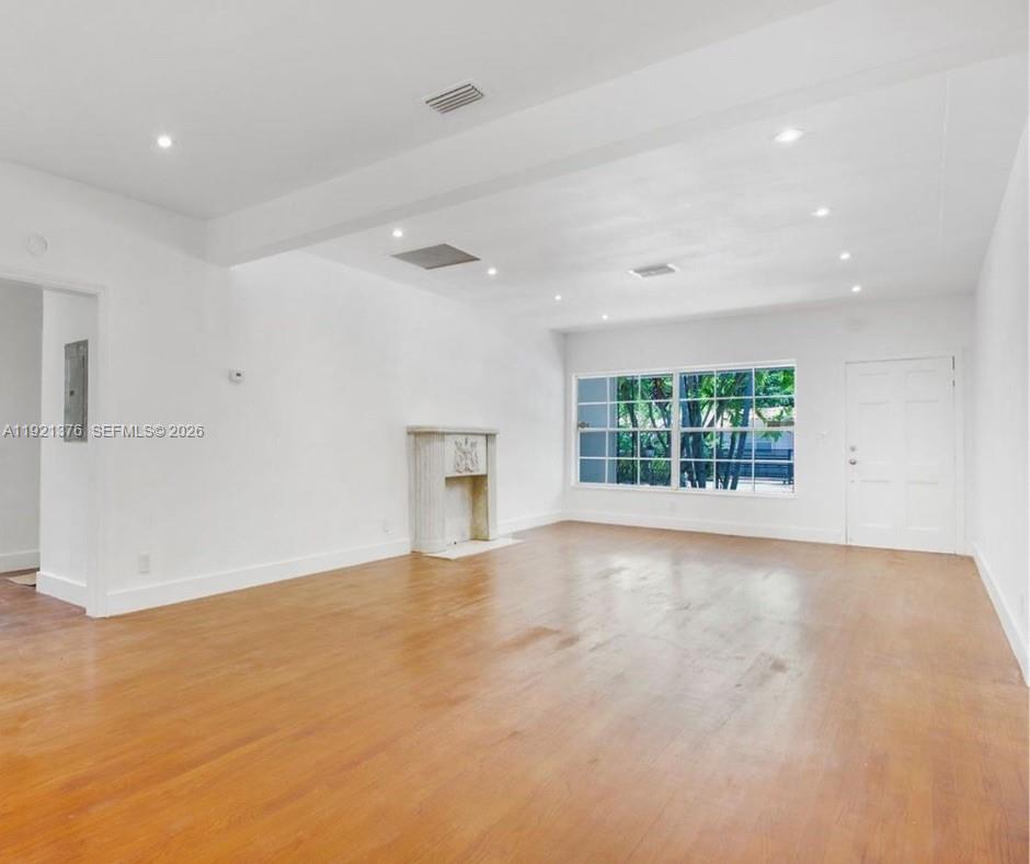 100 Southwest 30th Road Miami, FL 33129 - Photo 7 of 31 an empty room with windows