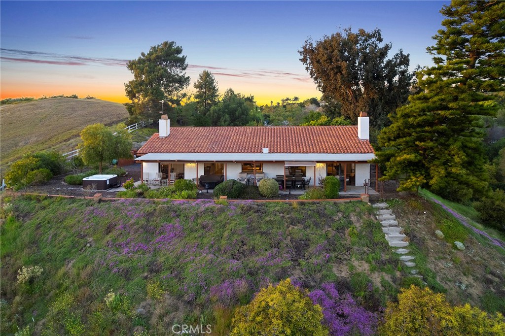 4613 Sleeping Indian Road Fallbrook, CA 92028 - Photo 49 of 75 a front view of a house with yard and green space