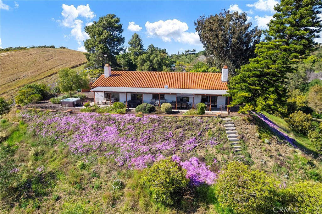 4613 Sleeping Indian Road Fallbrook, CA 92028 - Photo 74 of 75 a front view of a house with yard and street