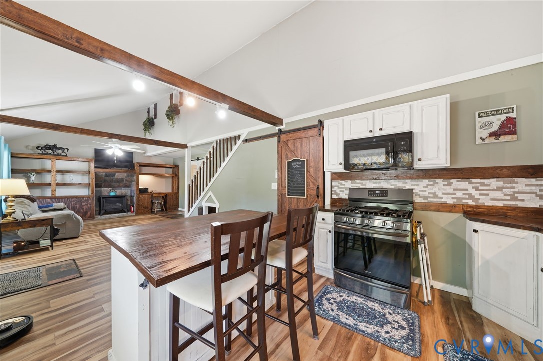 89 Old House Farm Road Bumpass, VA 23024 - Photo 12 of 67 Open-concept kitchen and dining area featuring exp