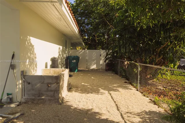a bathroom with a mirror and a sink