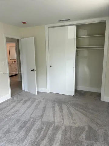 an empty room with window