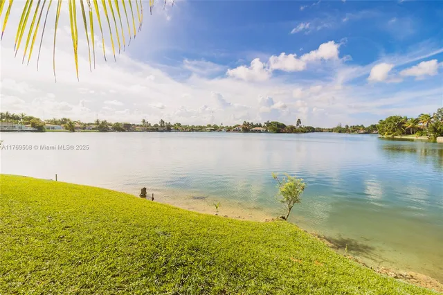 a view of a lake with a nearby beach