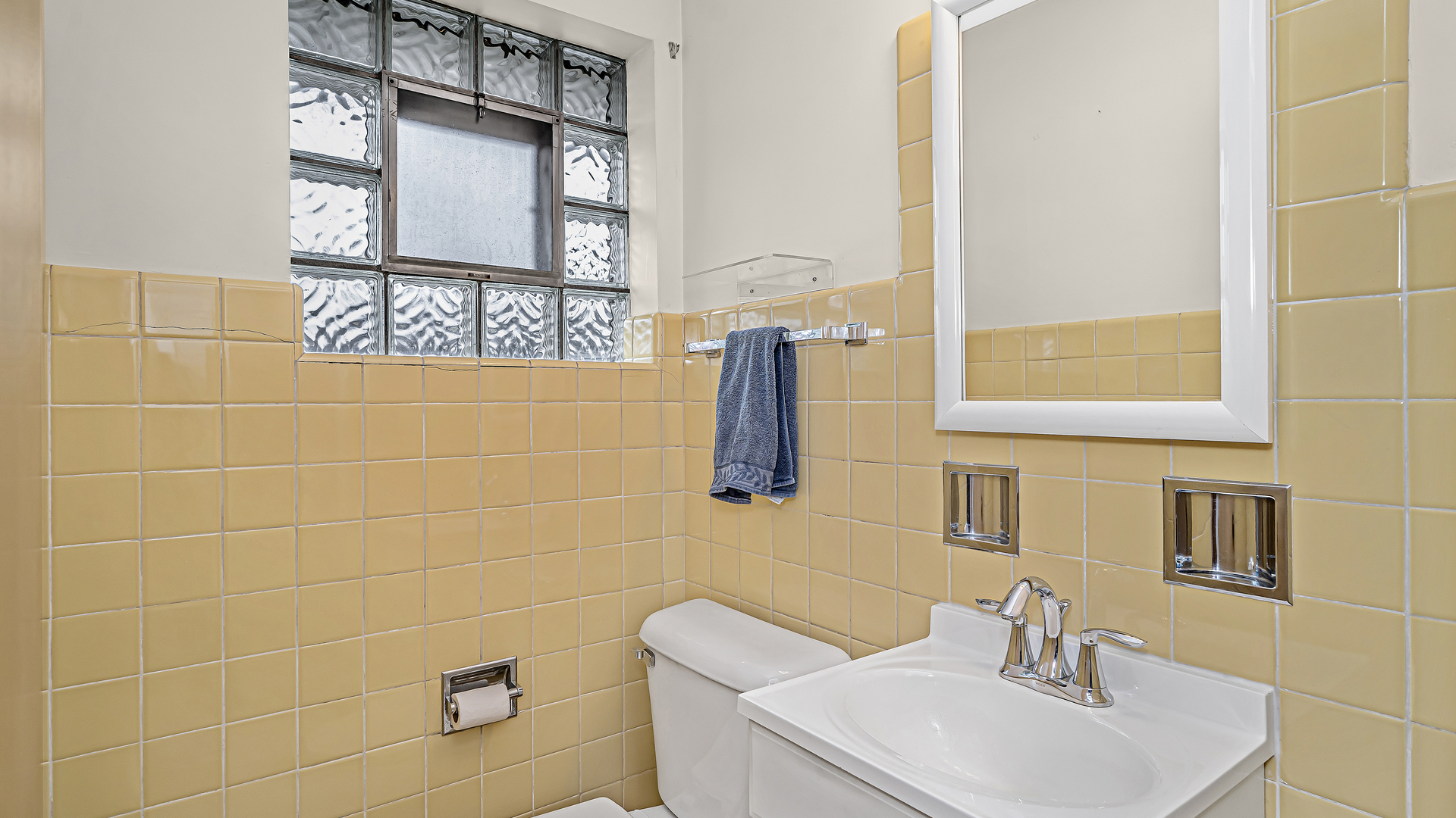 8000 Country Club Lane North Riverside, IL 60546 - Photo 12 of 19 a bathroom with a sink mirror and vanity