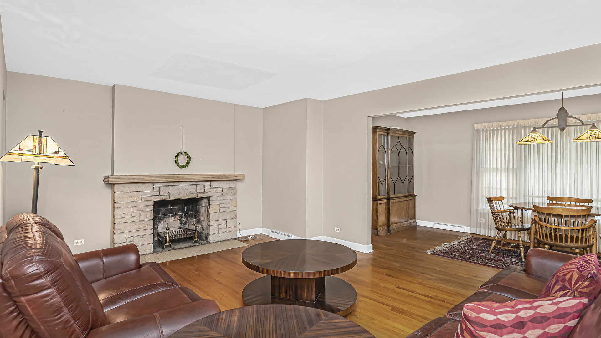 8000 Country Club Lane North Riverside, IL 60546 - Photo 3 of 19 a living room with furniture and a fireplace