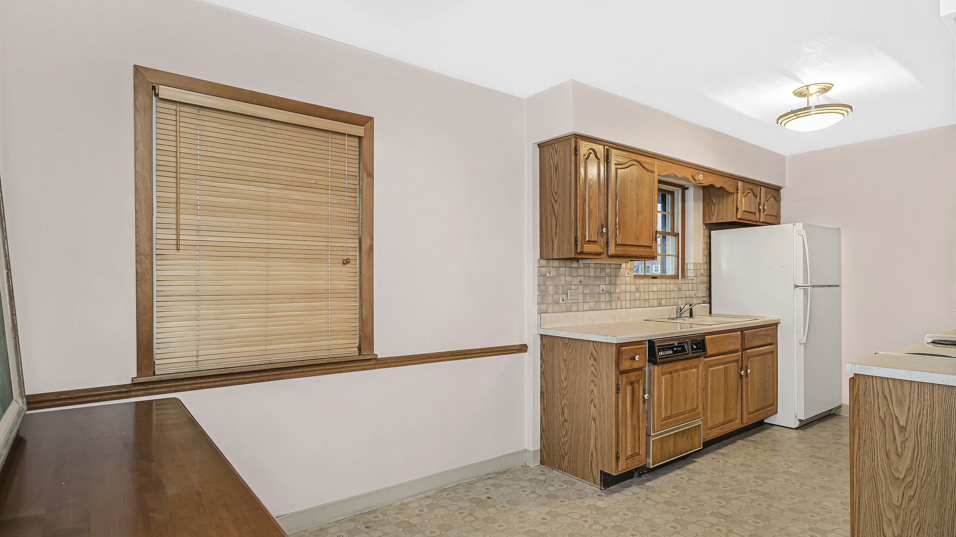 8000 Country Club Lane North Riverside, IL 60546 - Photo 6 of 19 a kitchen with stainless steel appliances granite countertop a stove and a refrigerator