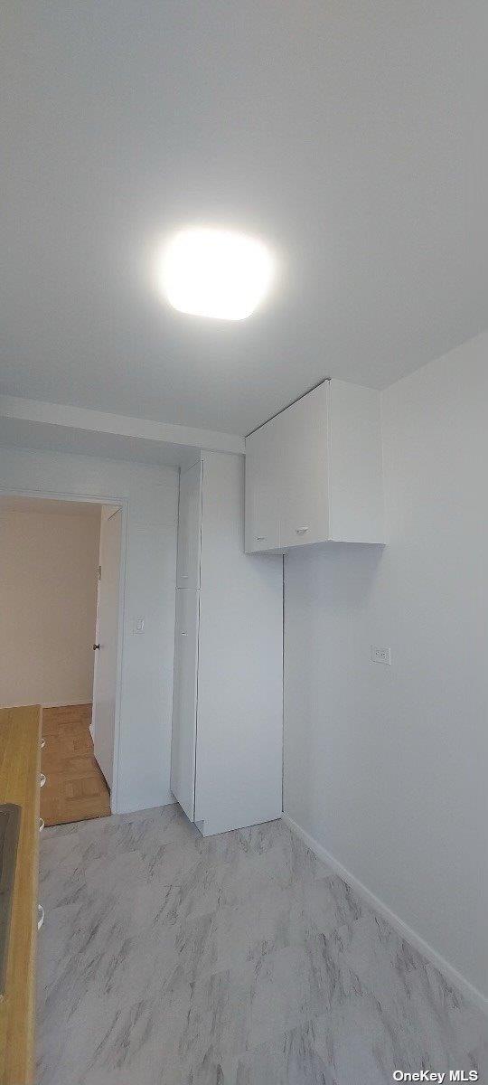 21-20 33rd Road, Unit 9C Queens, NY 11106 - Photo 7 of 9 a view of an empty room