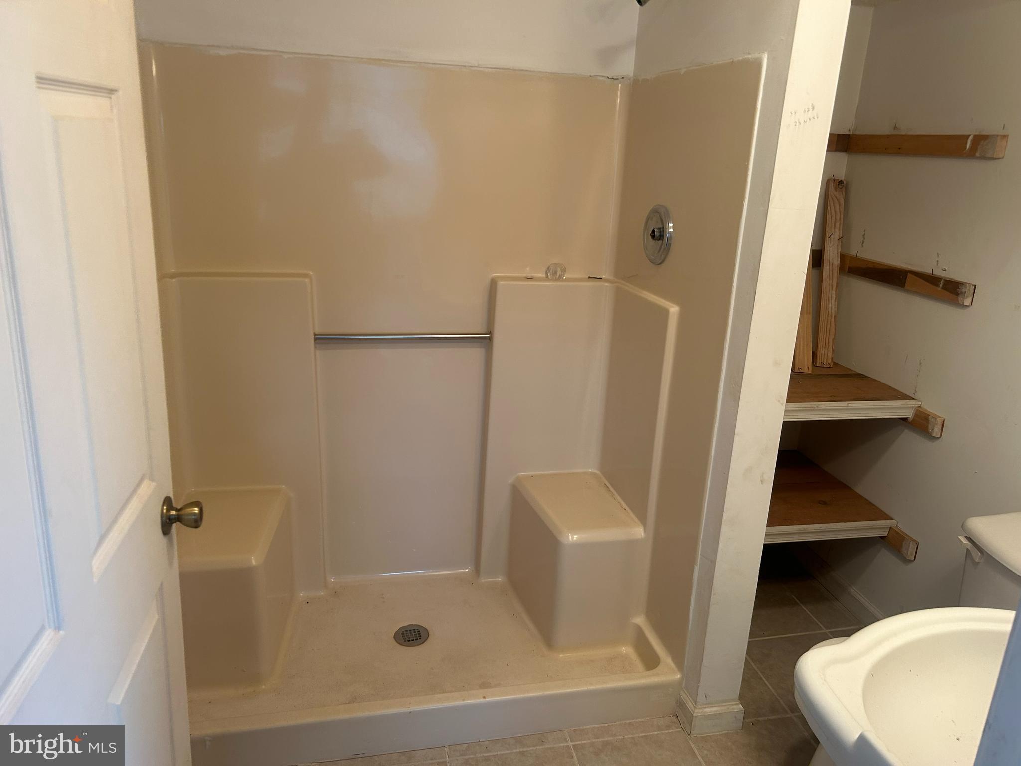 313 Penn Street Salisbury, MD 21801 - Photo 17 of 40 a bathroom with a shower