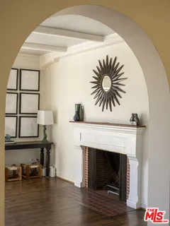a view of a livingroom with furniture and a fireplace