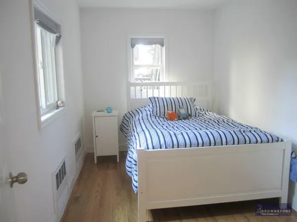 a view of bedroom with furniture