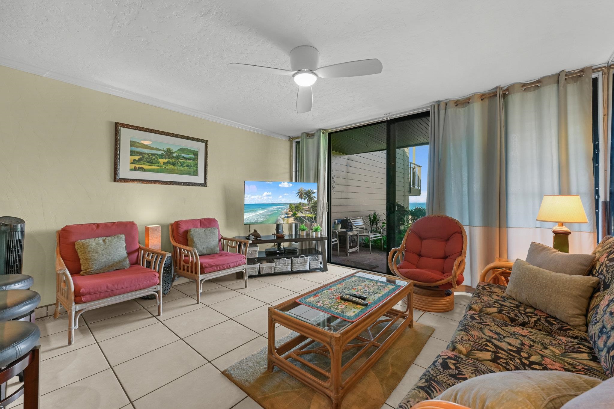 3975 Lower Honoapiilani Road, Unit 120 Lahaina, HI 96761 - Photo 2 of 22 a living room with furniture and a large window
