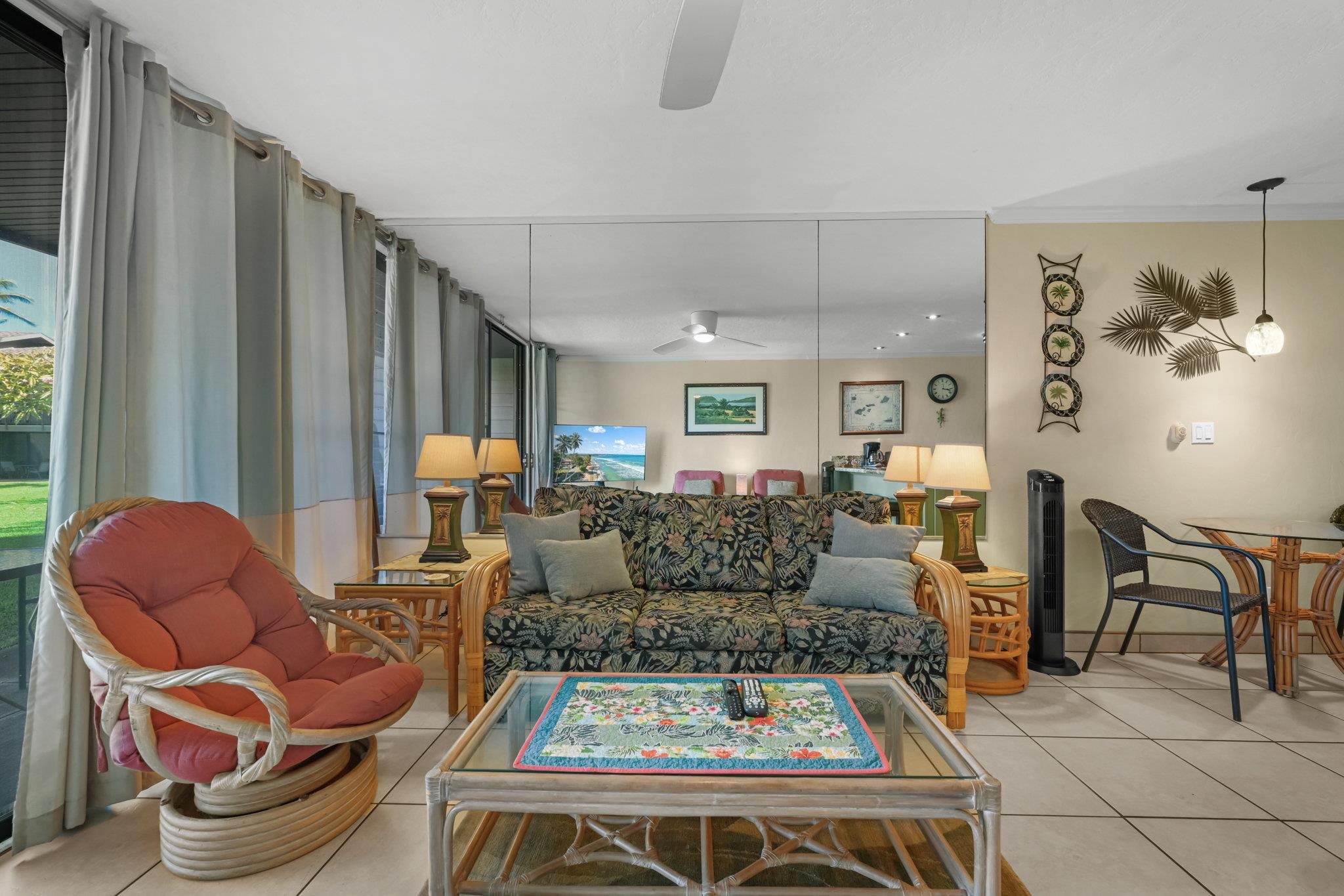 3975 Lower Honoapiilani Road, Unit 120 Lahaina, HI 96761 - Photo 6 of 22 a living room with furniture and a large window