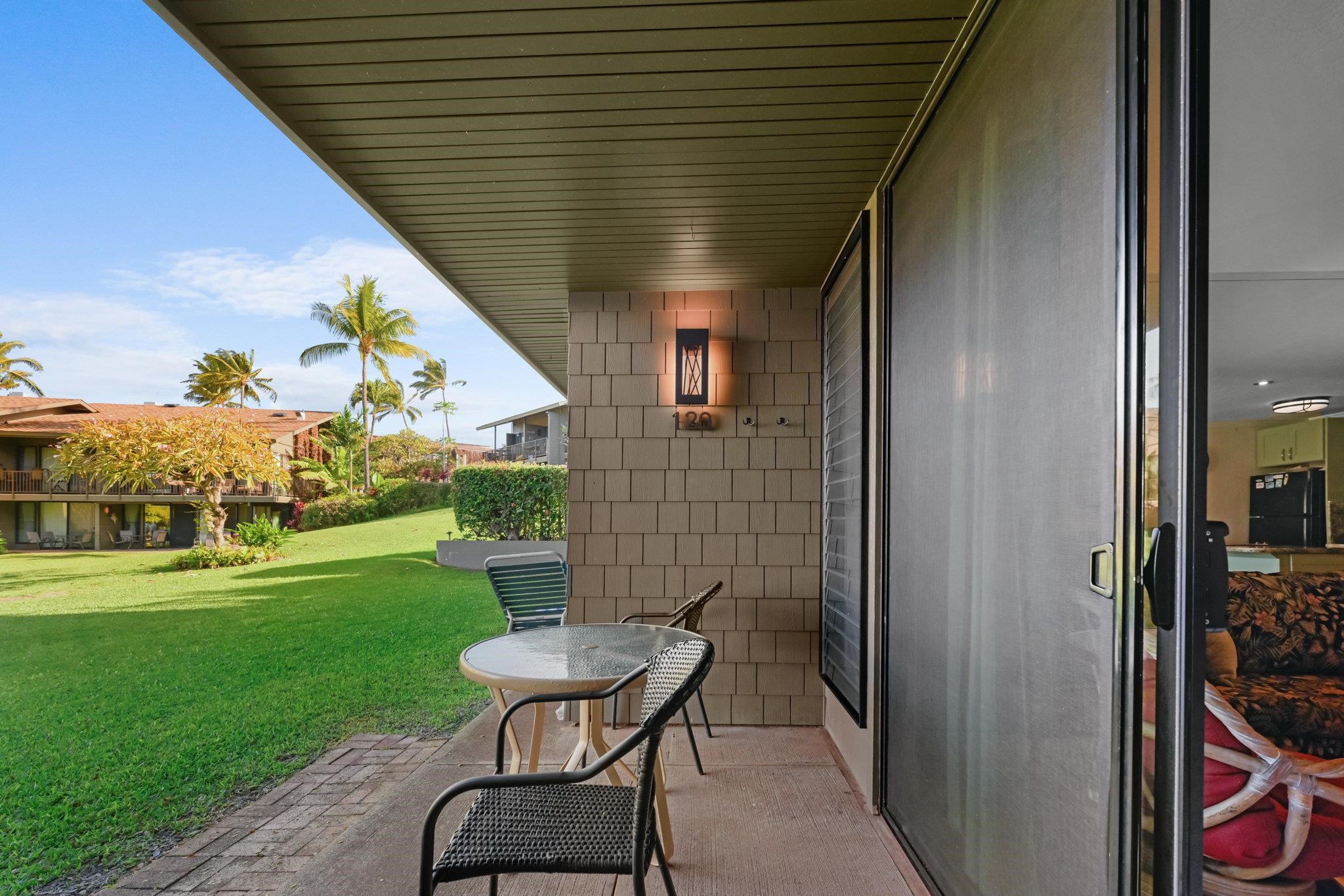 3975 Lower Honoapiilani Road, Unit 120 Lahaina, HI 96761 - Photo 10 of 22 a view of a porch with furniture and garden
