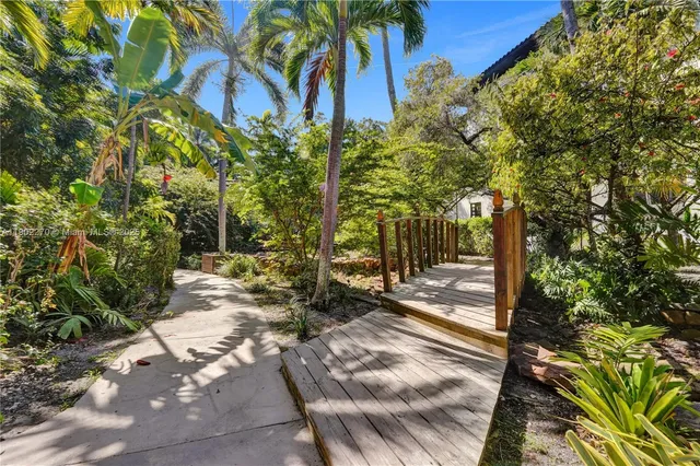 a view of a backyard with a garden