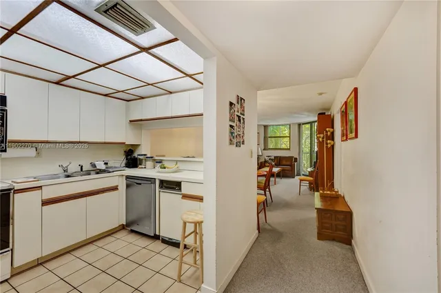 a kitchen with a stove and a microwave