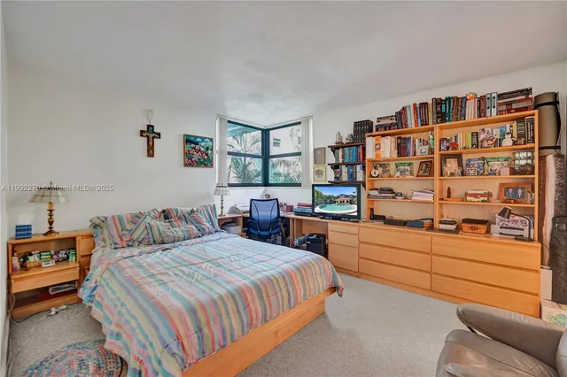 a room with chair and window