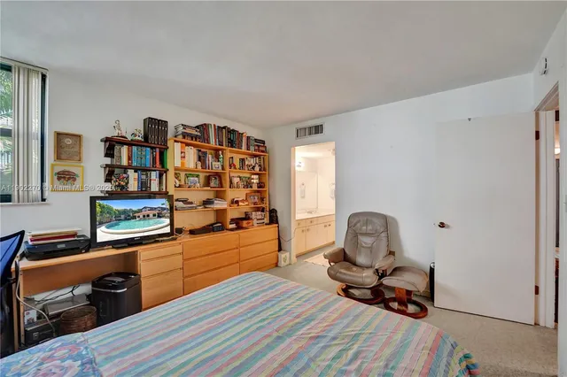 a spacious bathroom with a sink double vanity and a shower