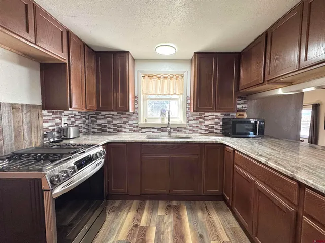 a view of a bedroom with washer and dryer