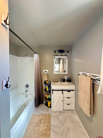 a view of a road in front of house