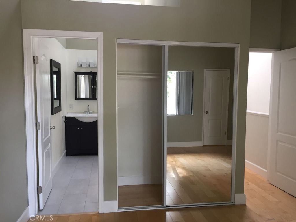 251 Pineview Irvine, CA 92620 - Photo 17 of 54 a view of a bathroom with a glass door and a bathroom