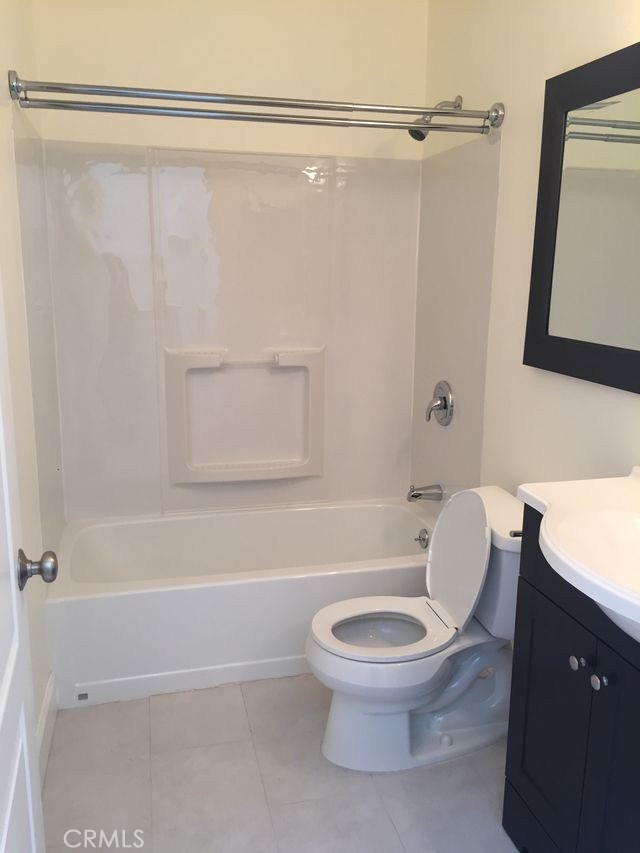 251 Pineview Irvine, CA 92620 - Photo 31 of 54 a white toilet sitting next to a bath tub