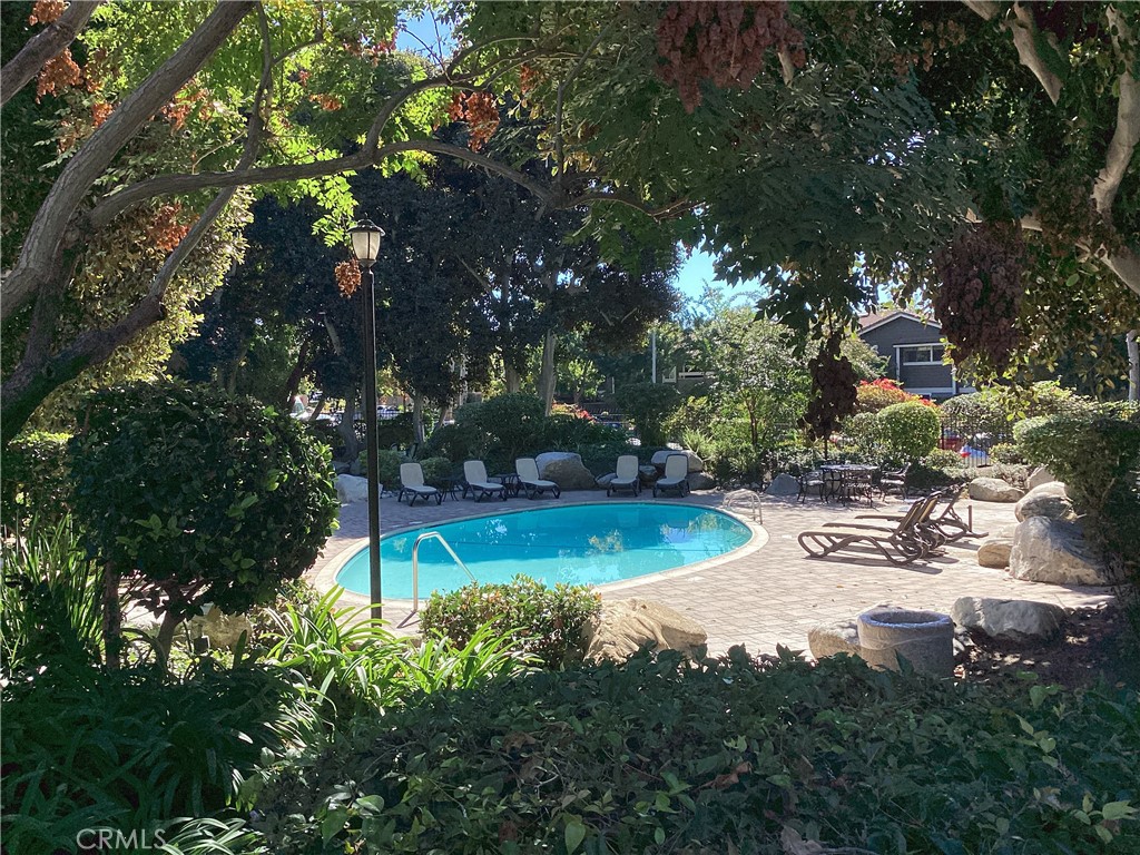 251 Pineview Irvine, CA 92620 - Photo 49 of 54 a view of a backyard with swimming pool