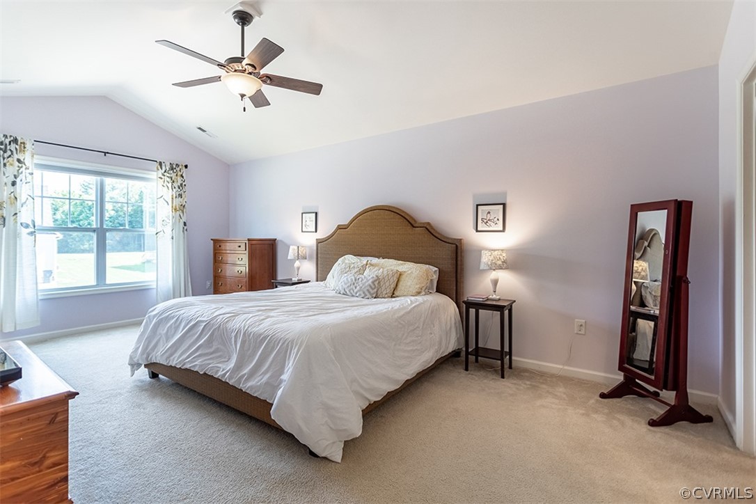 5531 Garden Grove Road Chesterfield, VA 23832 - Photo 22 of 32 a bedroom with a bed and a chandelier
