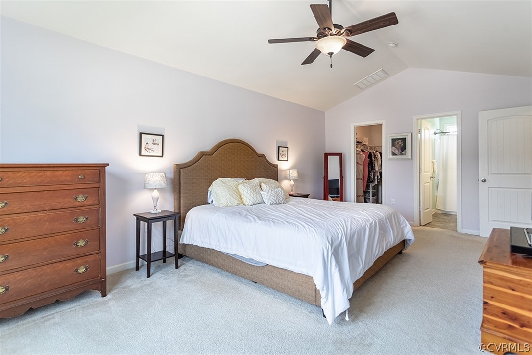 5531 Garden Grove Road Chesterfield, VA 23832 - Photo 23 of 32 a bedroom with a bed and a chandelier