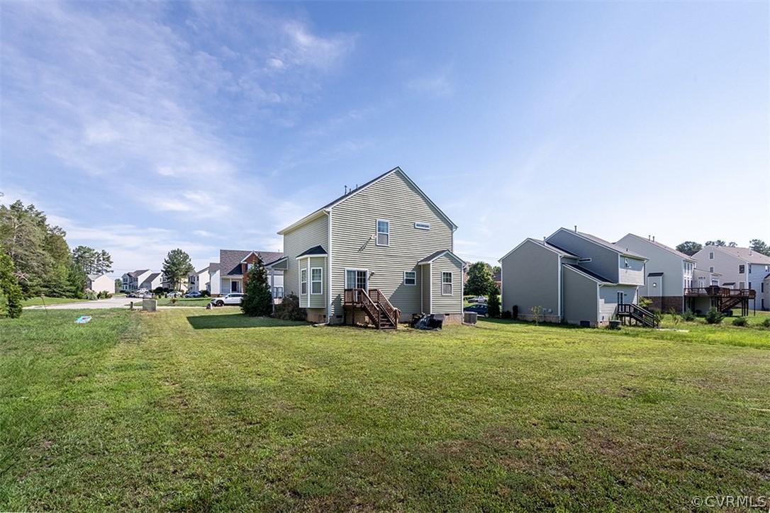 5531 Garden Grove Road Chesterfield, VA 23832 - Photo 28 of 32 a view of a house with a big yard and large trees