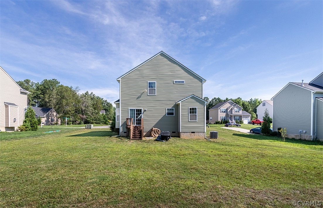 5531 Garden Grove Road Chesterfield, VA 23832 - Photo 29 of 32 a view of a house with a big yard and large trees