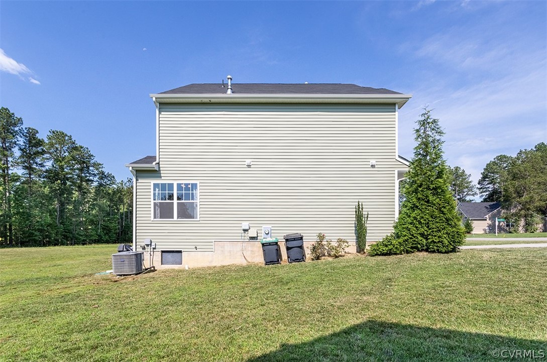 5531 Garden Grove Road Chesterfield, VA 23832 - Photo 31 of 32 a view of a house with a yard