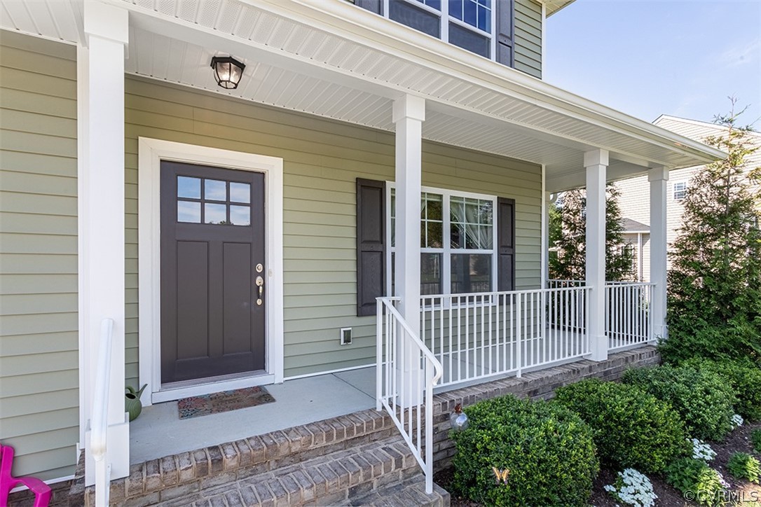 5531 Garden Grove Road Chesterfield, VA 23832 - Photo 5 of 32 front view of a house with a porch