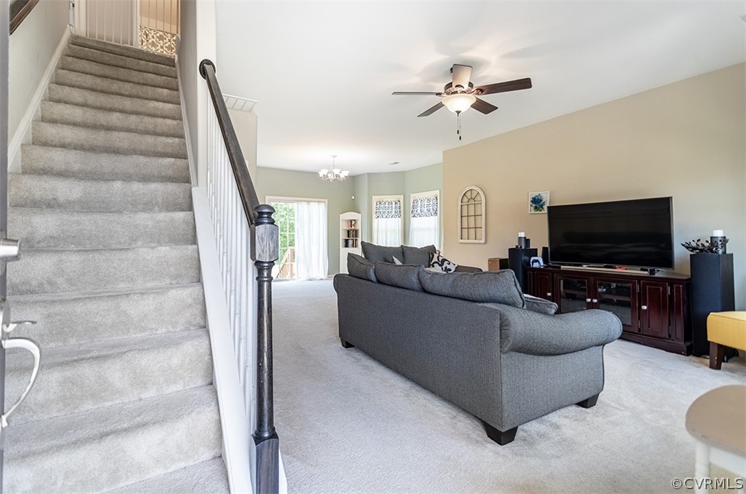 5531 Garden Grove Road Chesterfield, VA 23832 - Photo 6 of 32 a living room with furniture and a flat screen tv