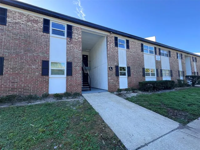 a view of a back yard of the house
