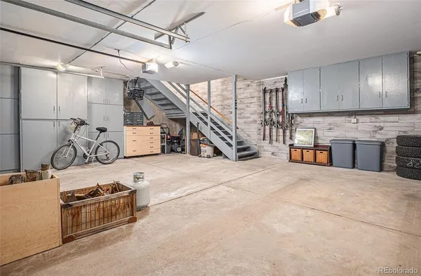 a kitchen with furniture and a stove