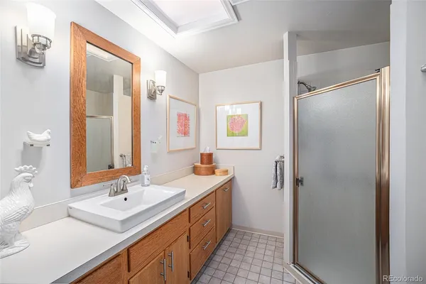 a bathroom with a double vanity sink mirror and double