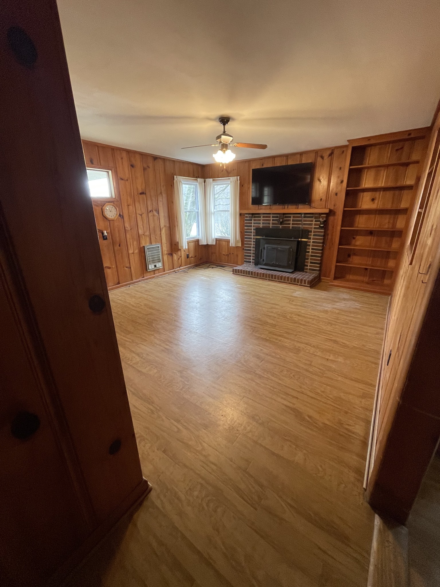 9210 Highway 64 Pulaski, TN 38478 - Photo 13 of 30 a view of kitchen and dining room with wooden floor